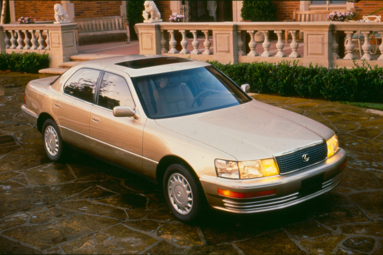 Front three-quarter view of a gold 1990 Lexus LS 400 sedan