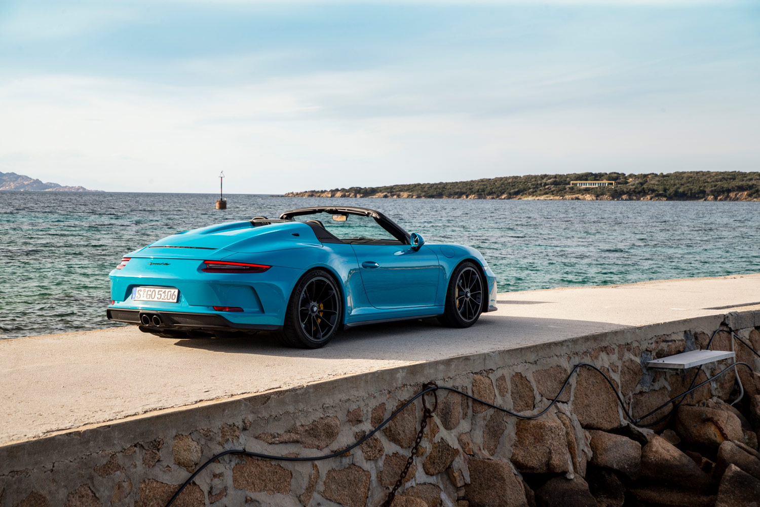 2019 Porsche 911 Speedster in blue overlooking the ocean