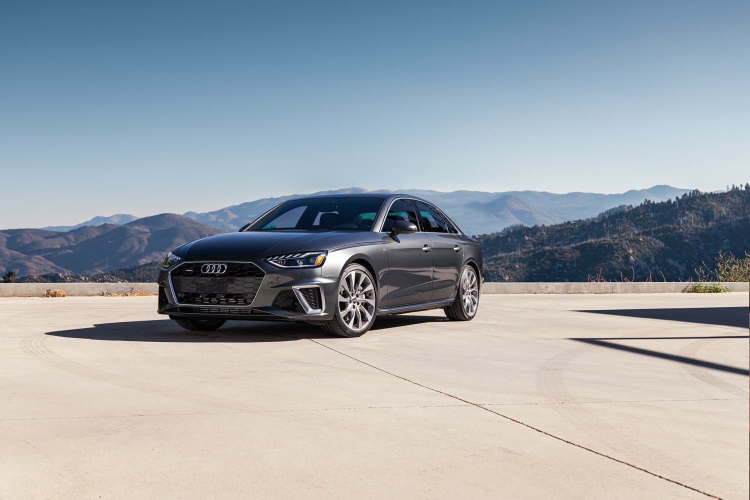 2024 Audi A4 in gray parked in front of mountain views