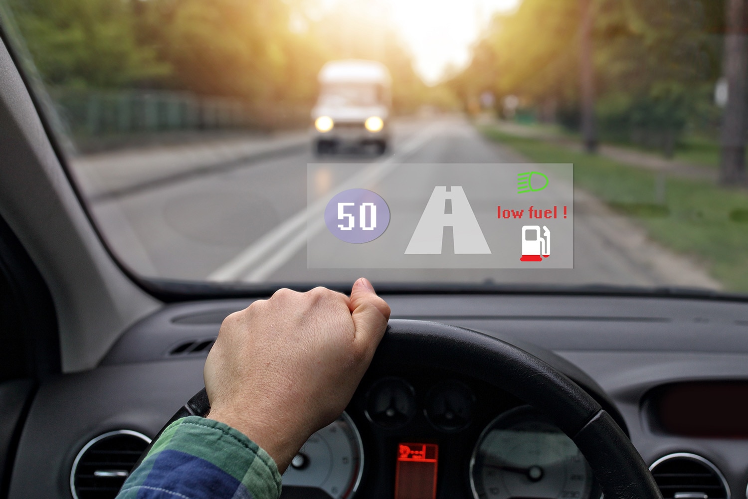 View from the driver's seat of a vehicle with a head-up display on the windshield