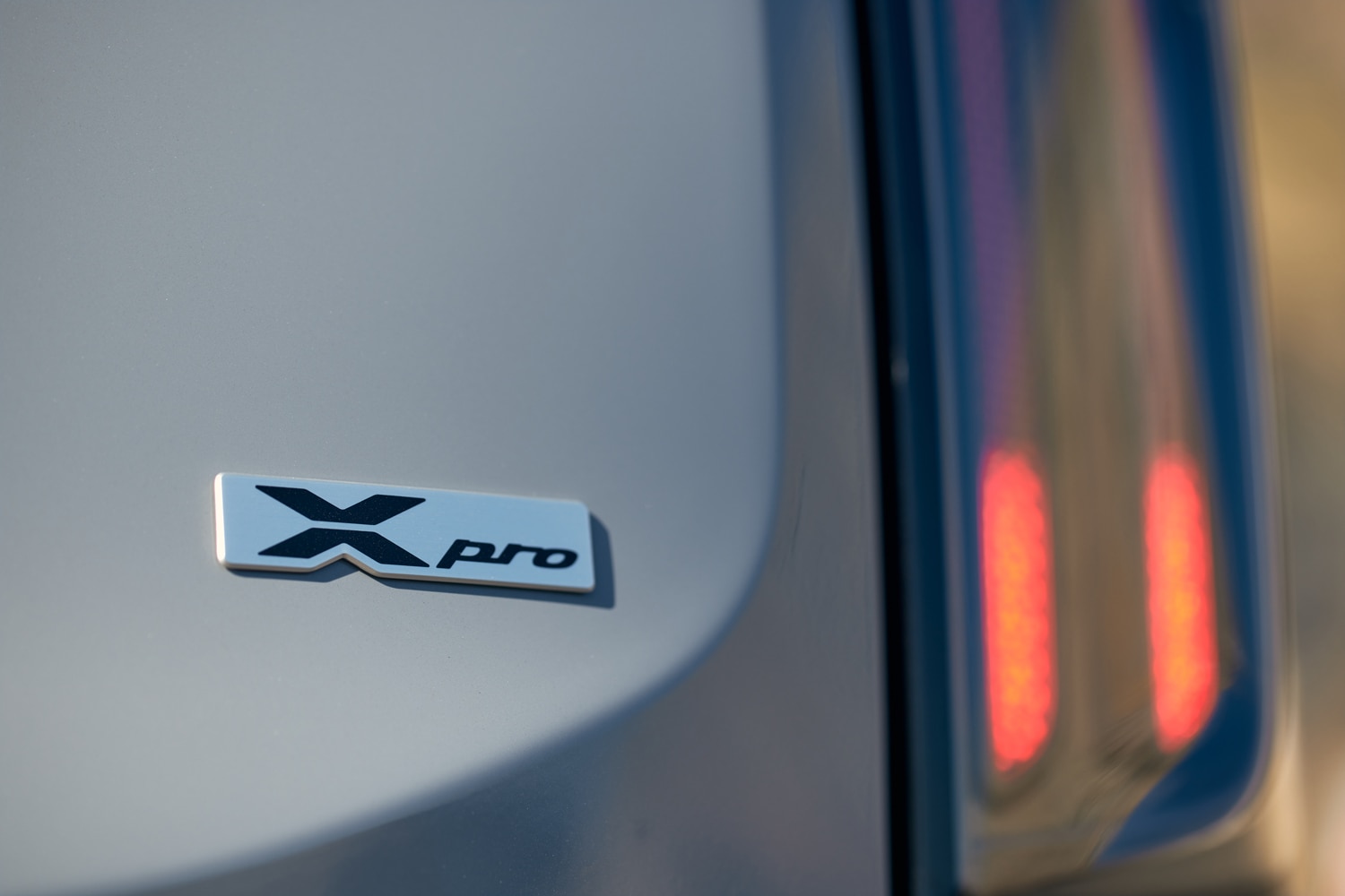 Closeup of an X-Pro badge on a 2024 Kia Telluride X-Pro