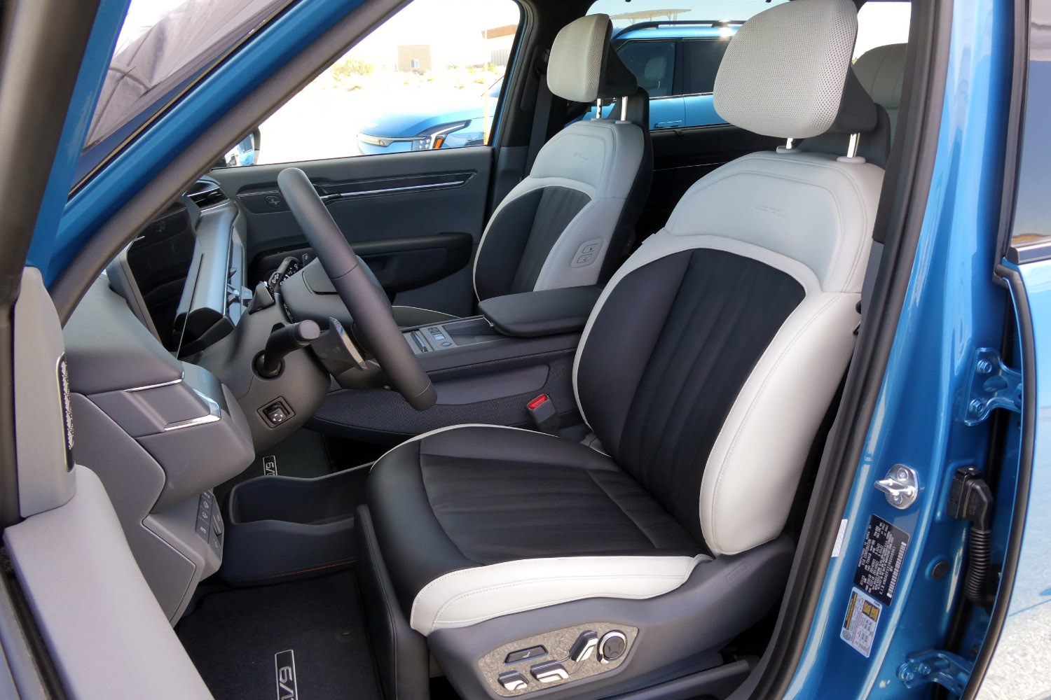 Front-seat interior view of a 2024 Kia EV9.