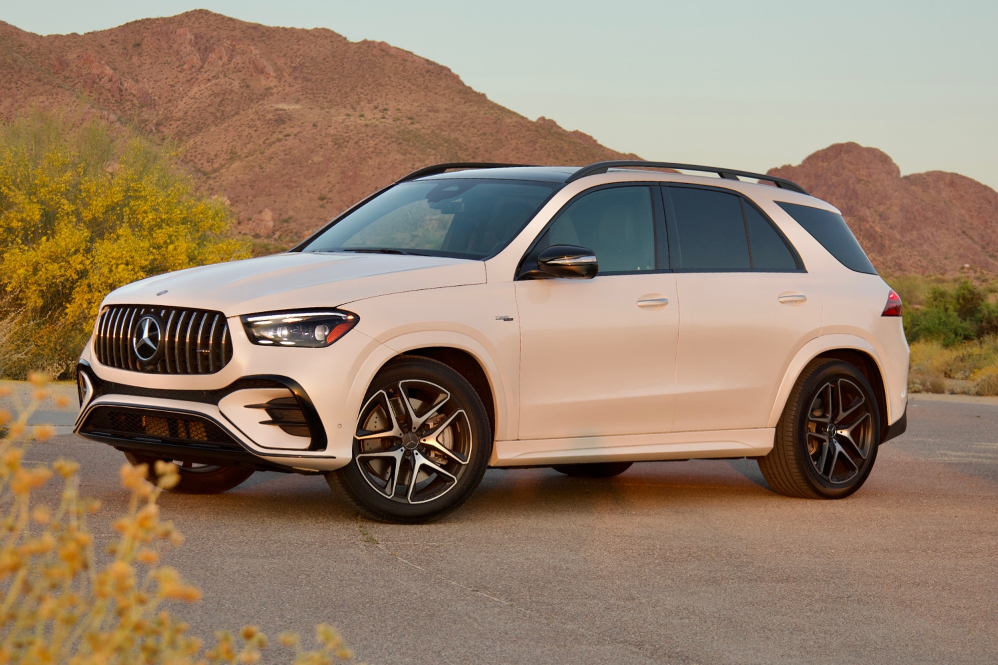 White 2024 Mercedes-AMG GLE 53 left front quarter in the mountains