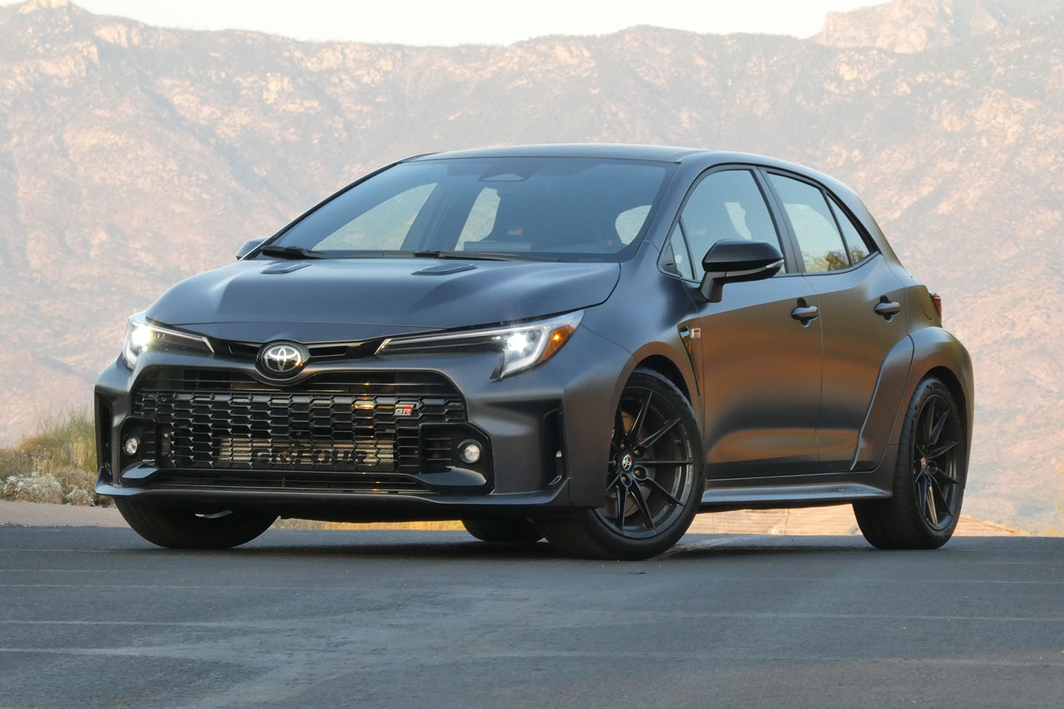 Front three-quarters view of a 2023 Toyota GR Corolla in Smoke.