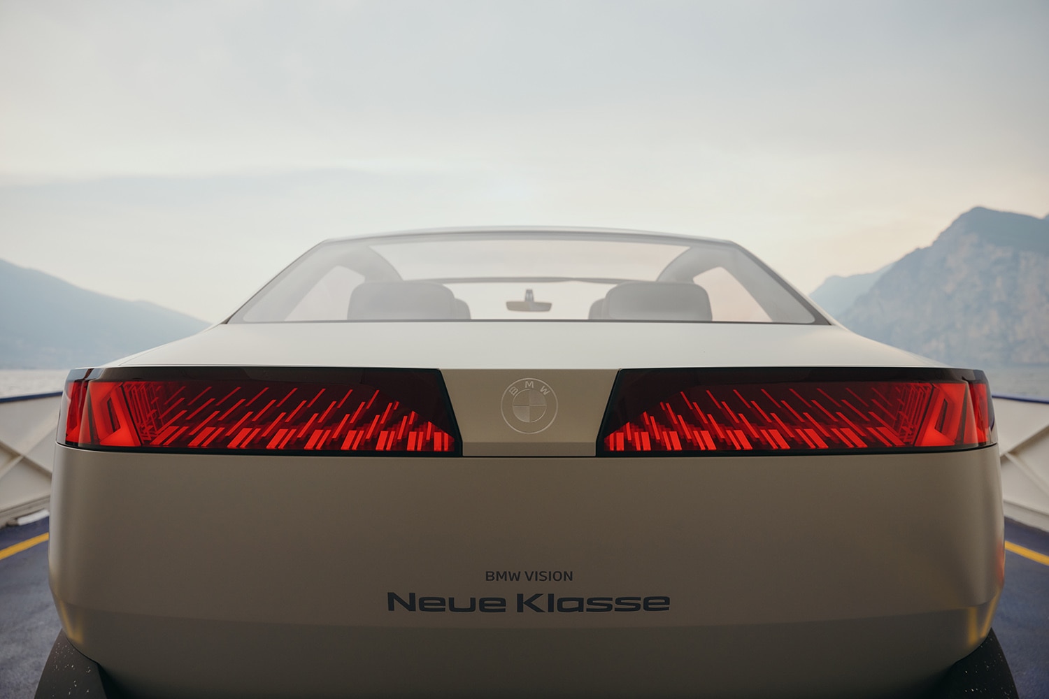 BMW Vision Neue Klasse in Joyous Bright off-white, close rear view of the taillights