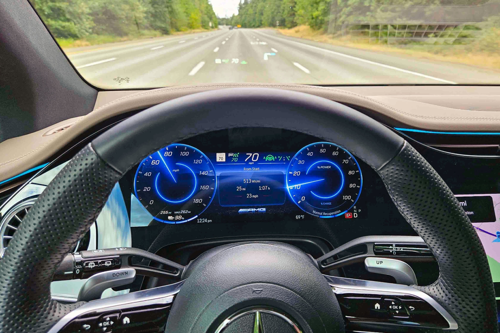 2024 Mercedes-AMG EQE SUV safety features and dashboard driving down highway