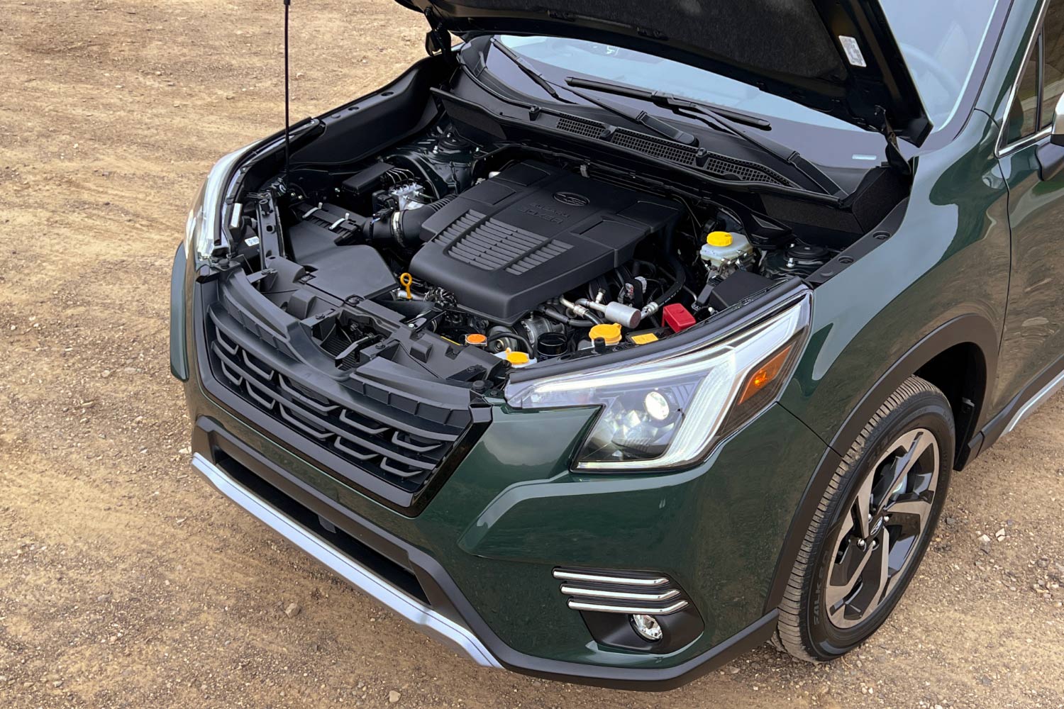 The engine bay of a green 2024 Subaru Forester