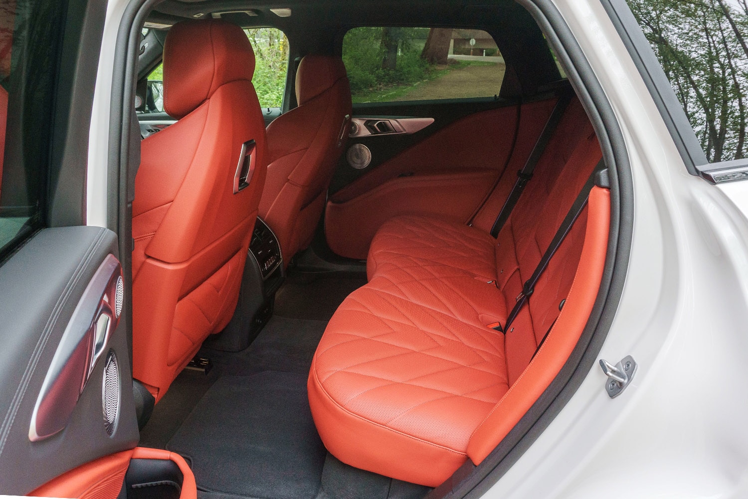 2023 BMW XM interior, with back seats trimmed in Sakhir Orange
