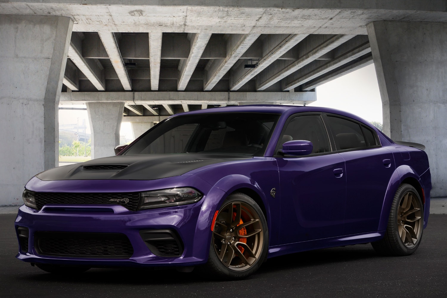 2022 Dodge Charger SRT Jailbreak in purple parked under an overpass