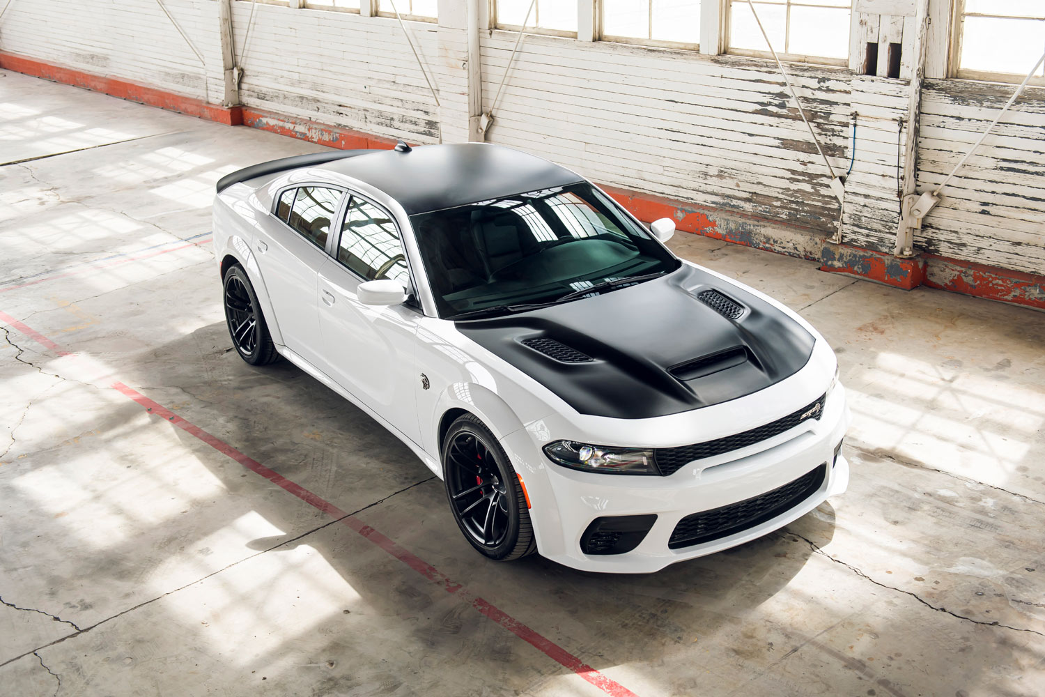 2023 Dodge Charger SRT Hellcat Redeye in white with a black hood and roof