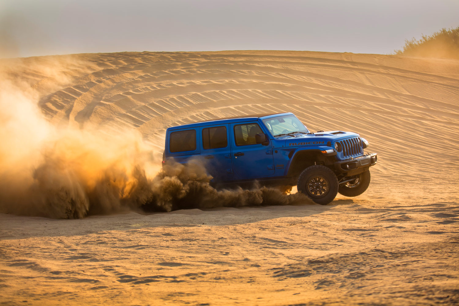 Blue 2022 Jeep Wrangler Rubicon 392 drives in the desert
