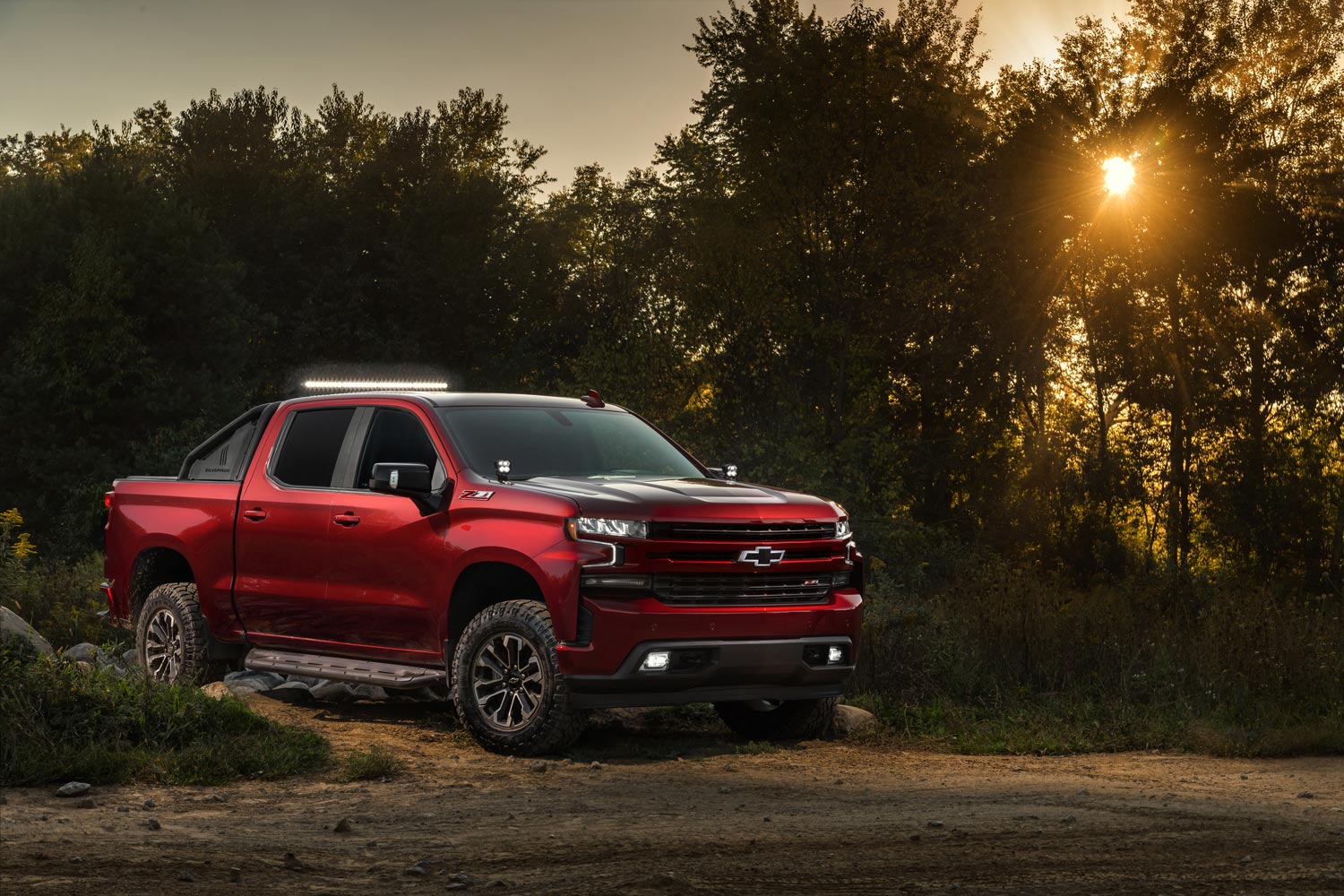 2018 Chevrolet Silverado RST concept truck parked by trees off road.