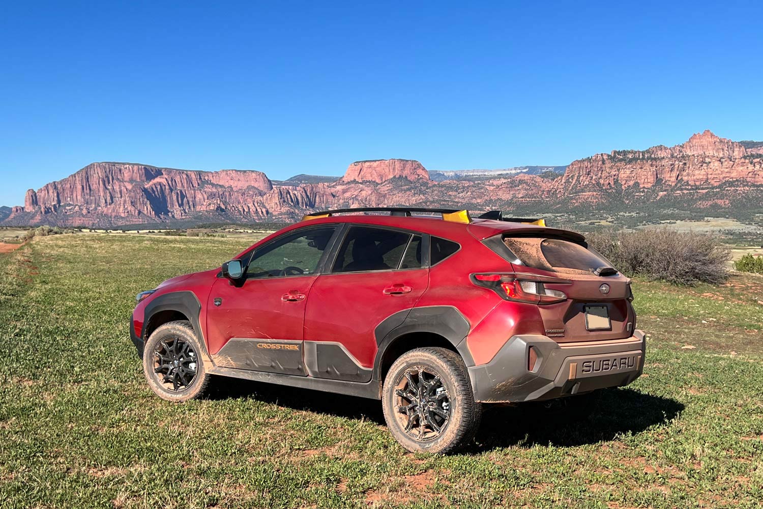 Side view of a red 2024 Subaru Crosstrek Wilderness