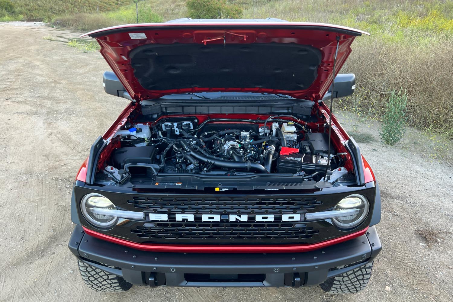 Engine underhood view of 2023 Ford Bronco in red