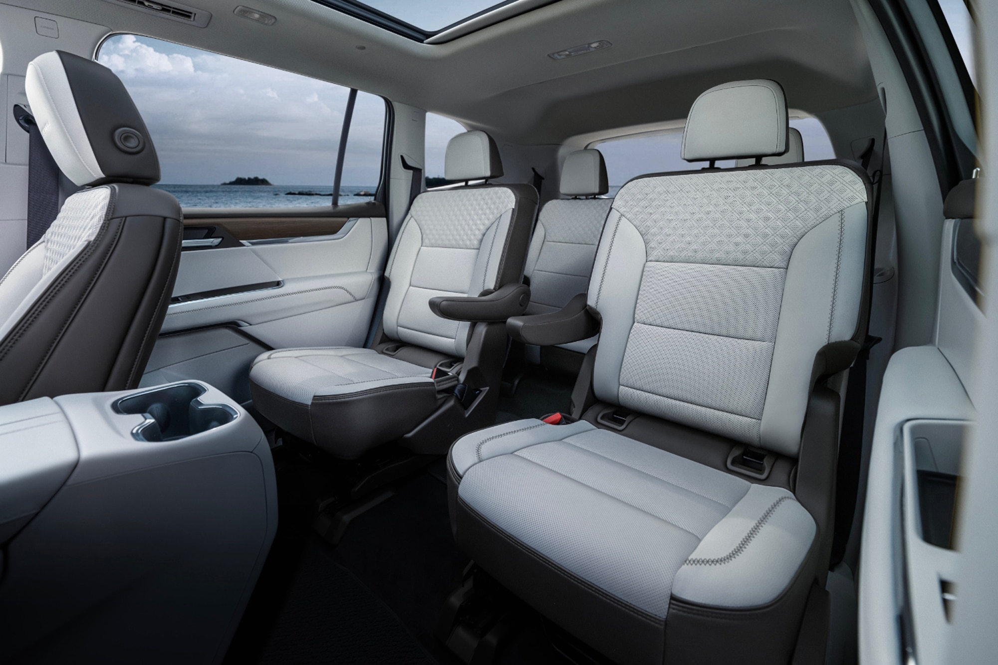 2024 GMC Acadia Denali second row interior in white with ocean view