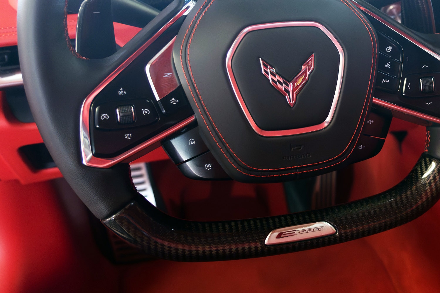 2024 Chevrolet Corvette E-Ray steering wheel, button controls, and toggles.