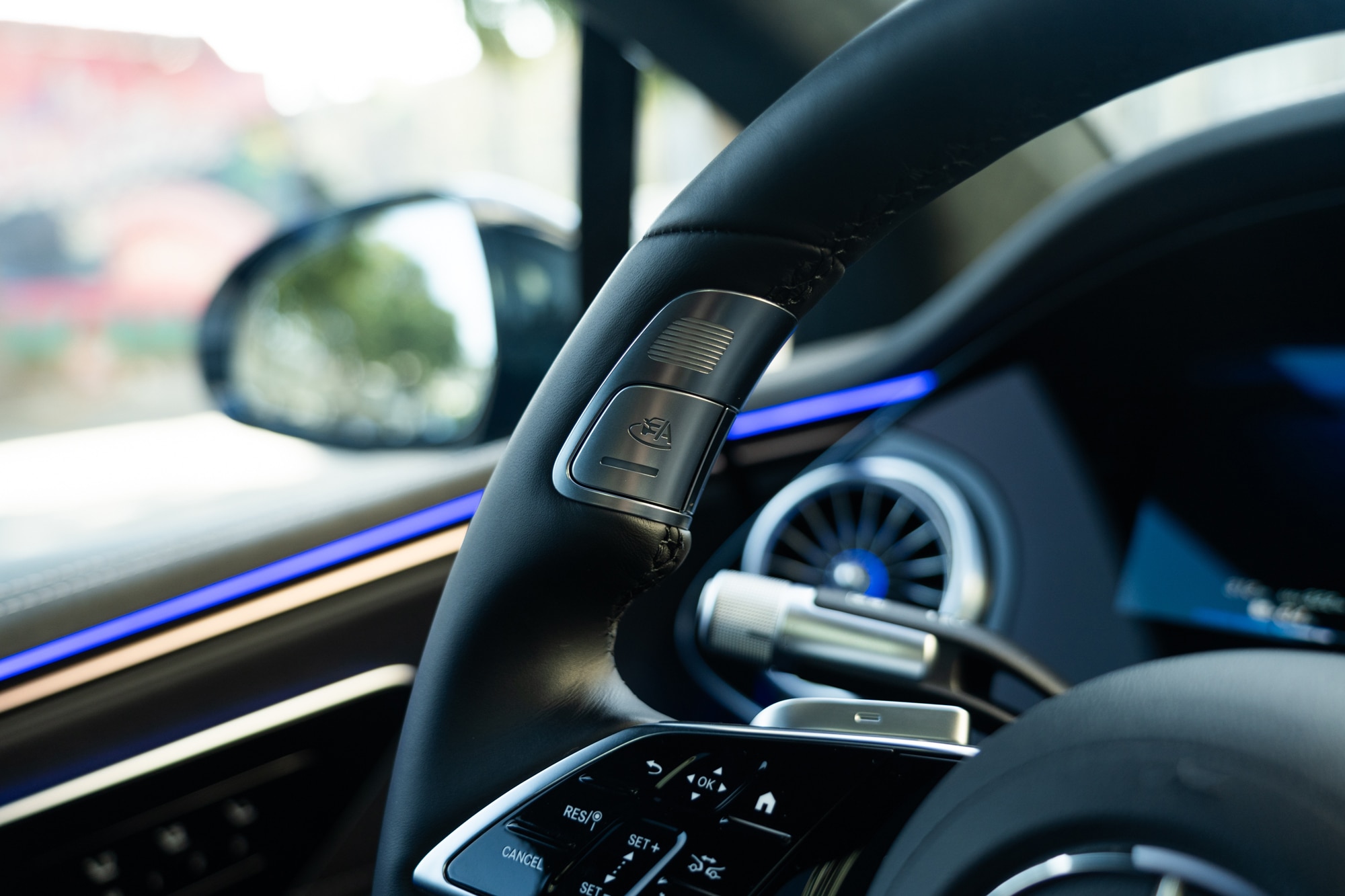 Mercedes-Benz Drive Pilot engagement button on steering wheel