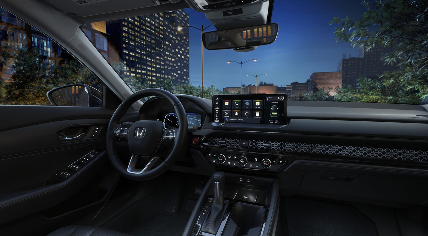 Interior cockpit of 2023 Honda Accord with infotainment screen lit up