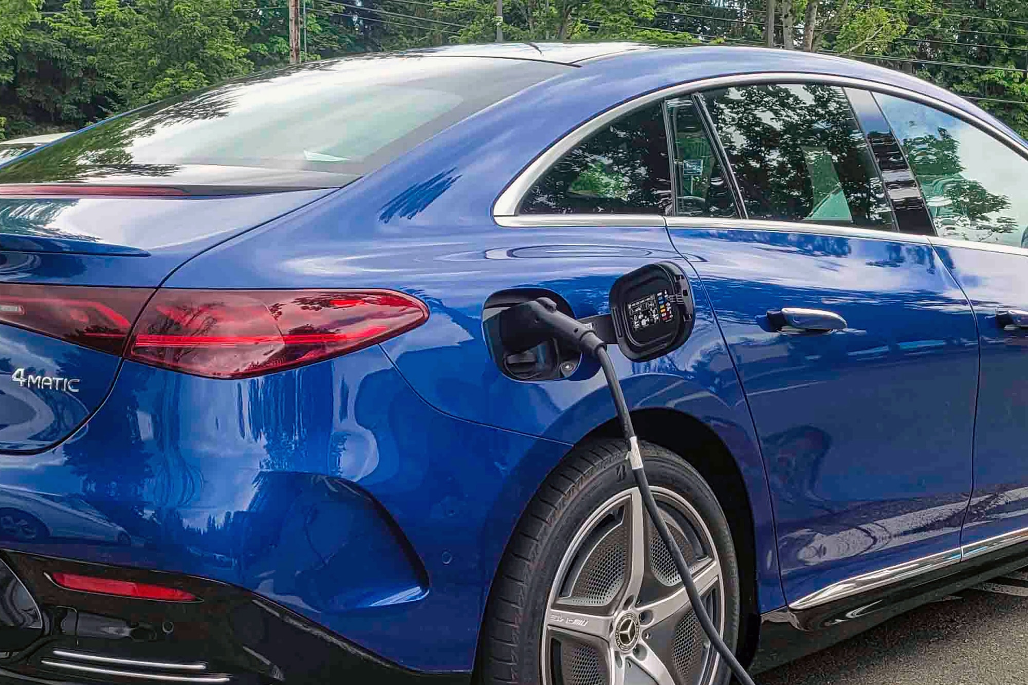 2023 Mercedes-Benz EQE Sedan in Starling Blue plugged in and charging