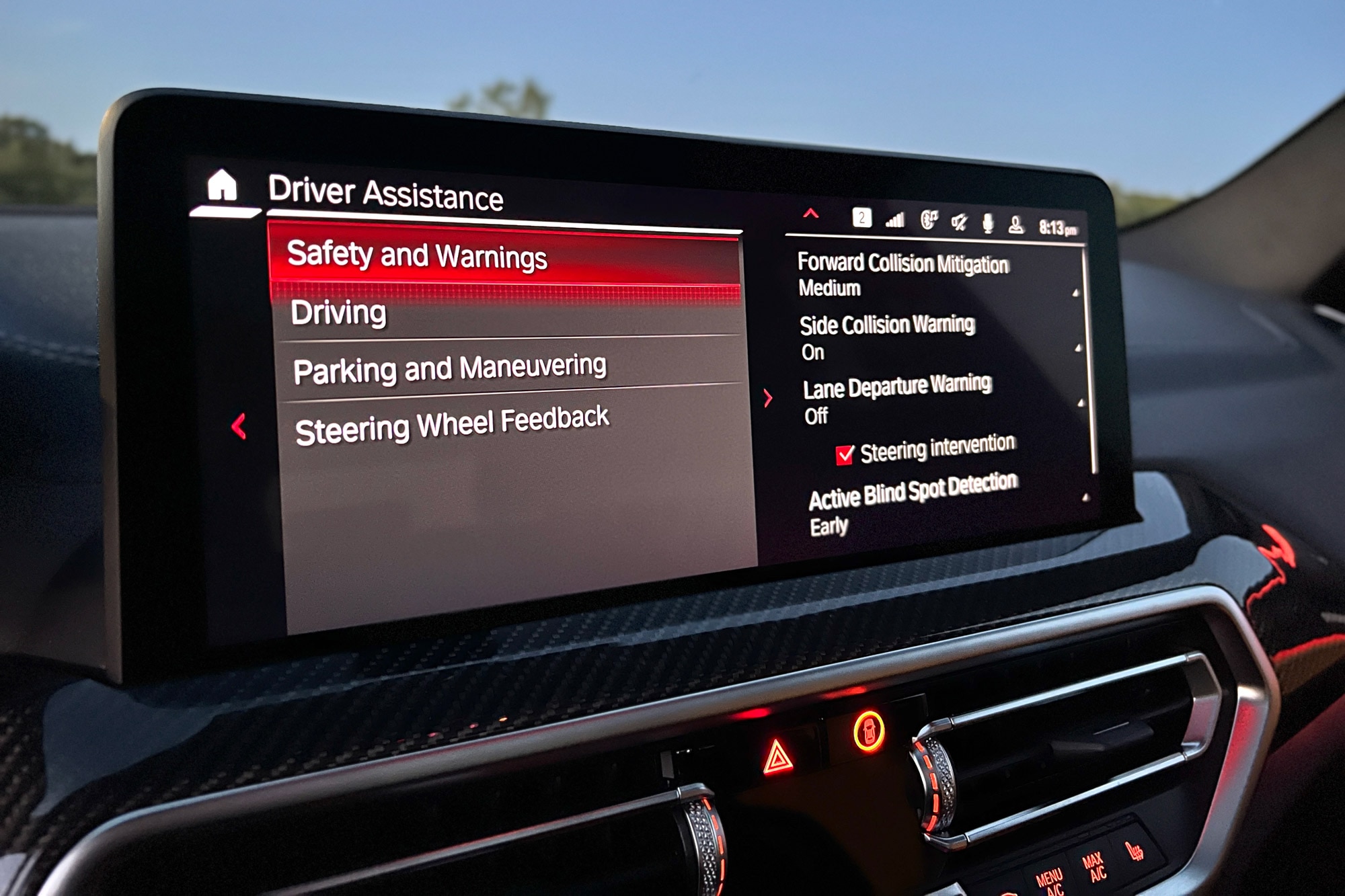 2023 BMW X3 M infotainment screen showing driver assistance safety features