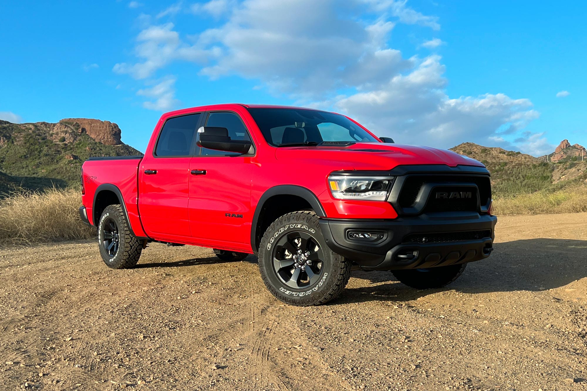 Front three-quarter view of a red 2024 Ram 1500 Rebel