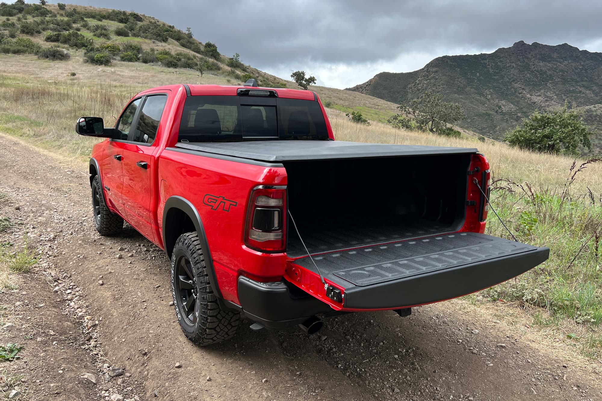 Rear three-quarter view of a red 2024 Ram 1500 Rebel