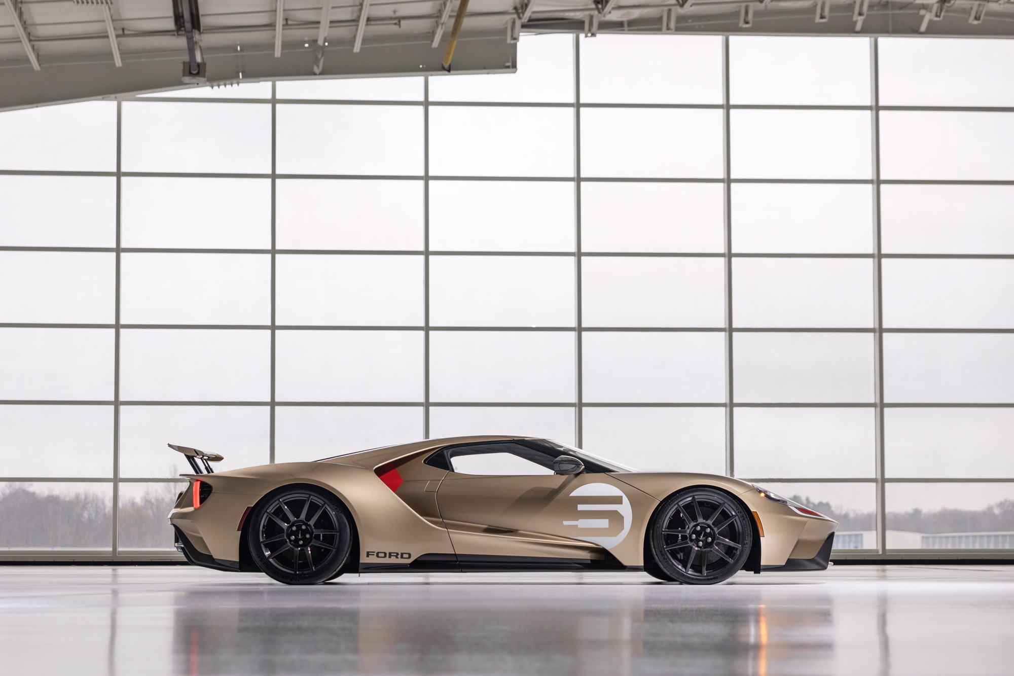 Side view of a bronze 2022 Ford GT