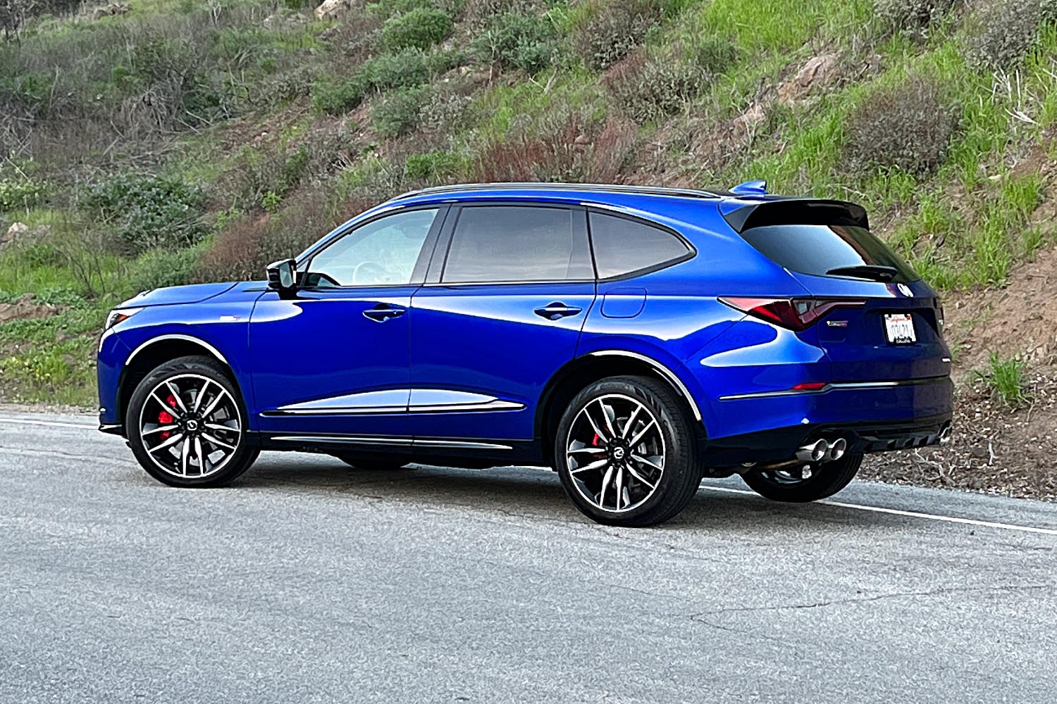 2023 Acura MDX Type S in Apex Blue Pearl, rear three-quarter view.