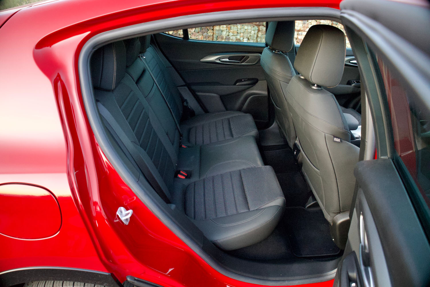 Back seats of Red 2024 Alfa Romeo Tonale Ti