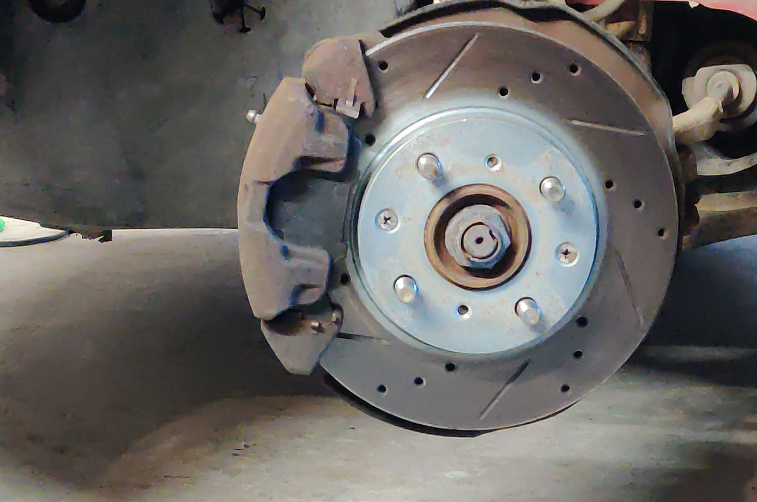 Brake rotor exposed without wheel and tire