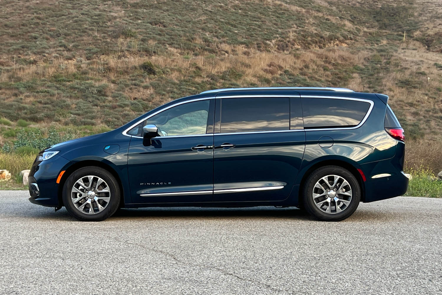 Blue 2023 Chrysler Pacifica Hybrid minivan side view