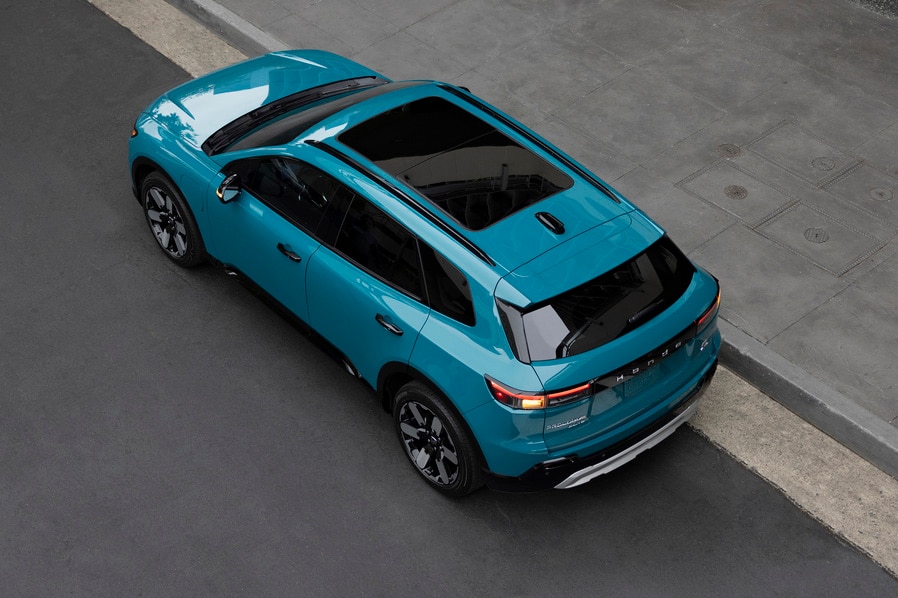 Overhead view of a blue 2024 Honda Prologue parked along a curb