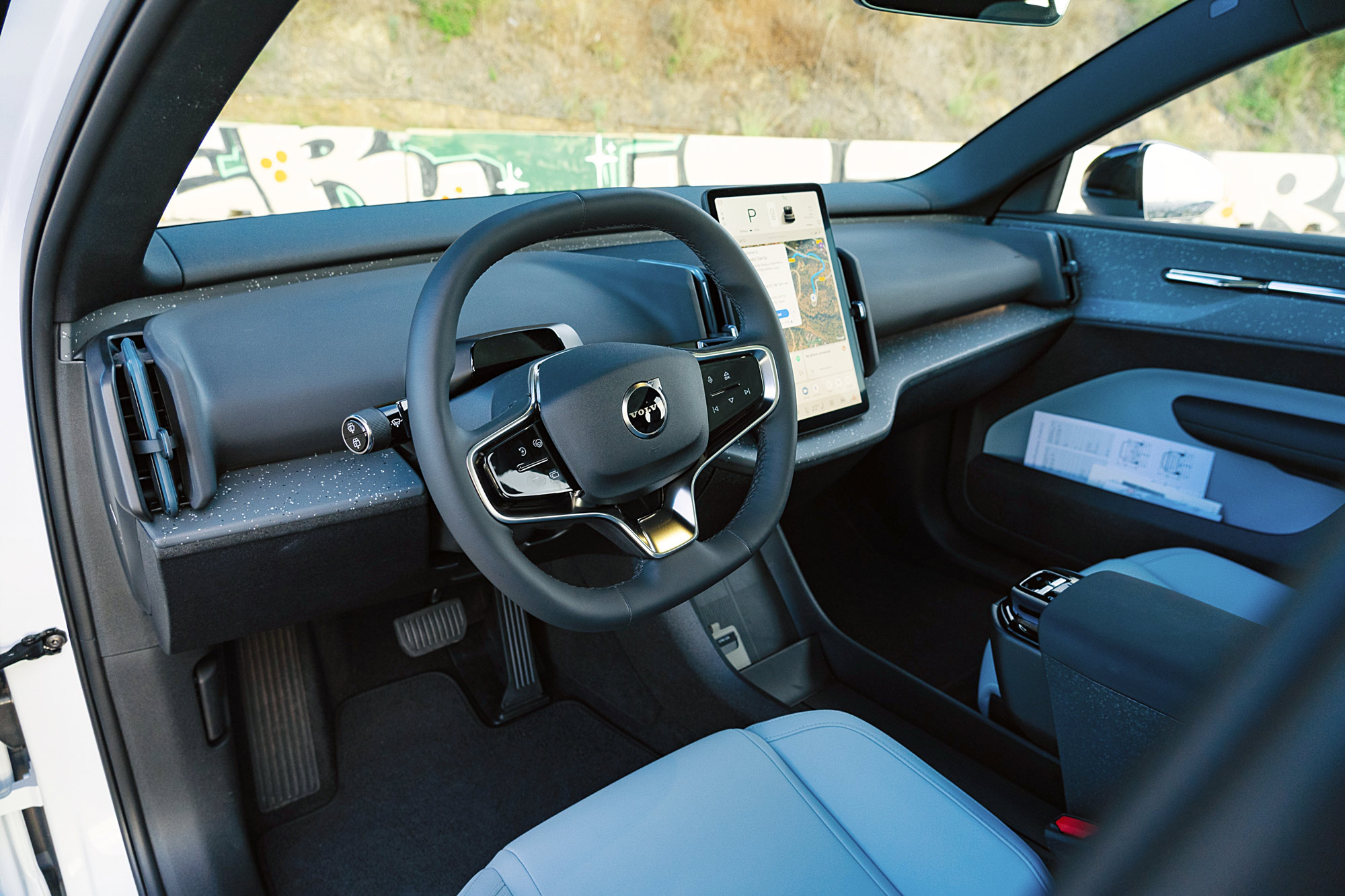 2025 Volvo EX30 interior and infotainment screen.