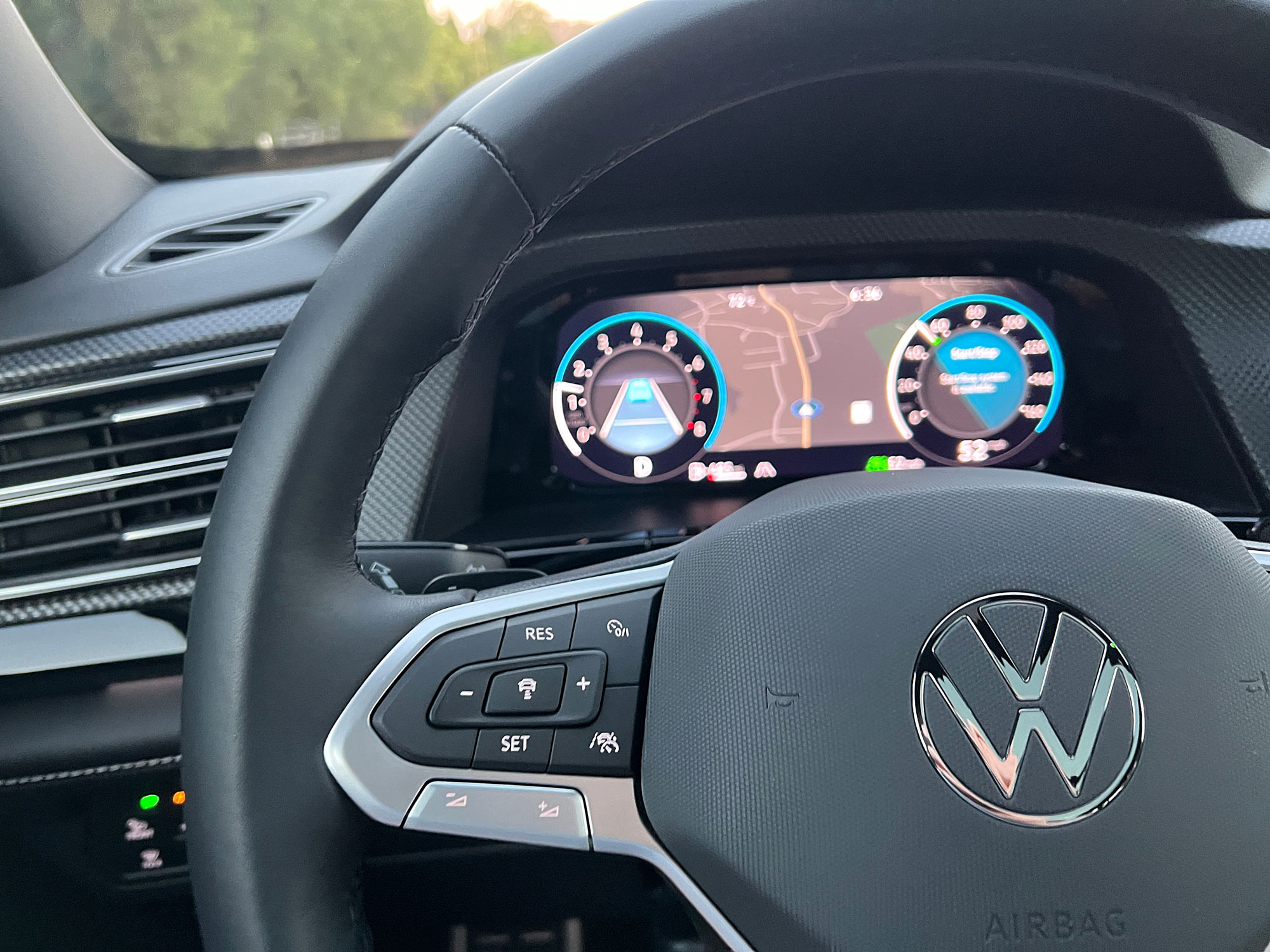 Steering wheel and driver gauges in a 2024 Volkswagen Atlas Cross Sport