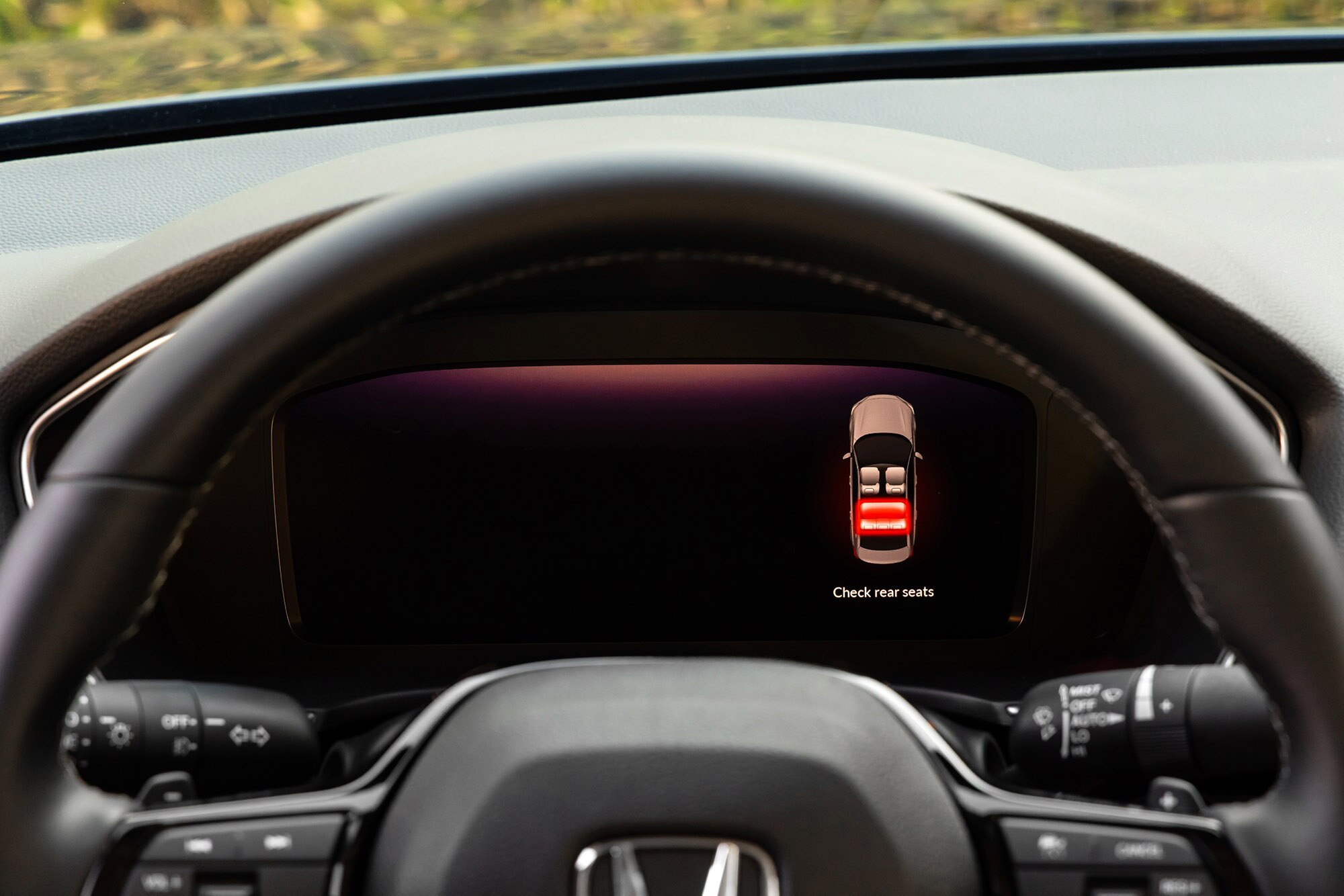 Rear seat reminder digital safety alert on gauge cluster in current-generation Honda Civic