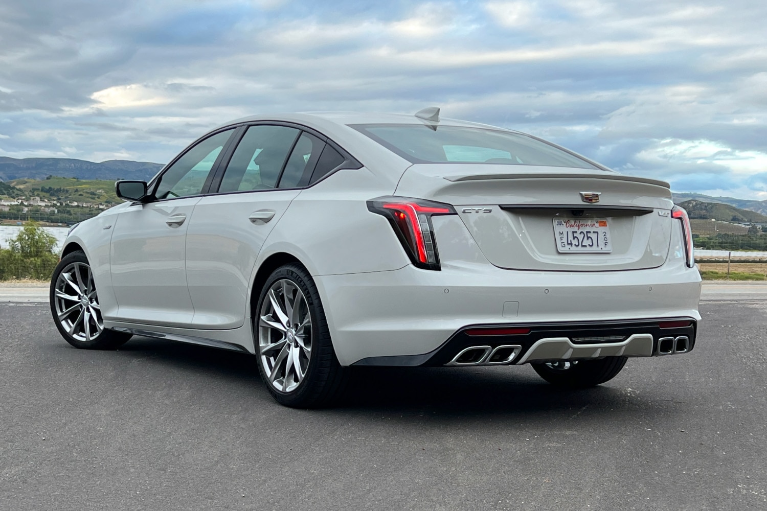 Left rear quarter view of a white 2023 Cadillac CT5-V