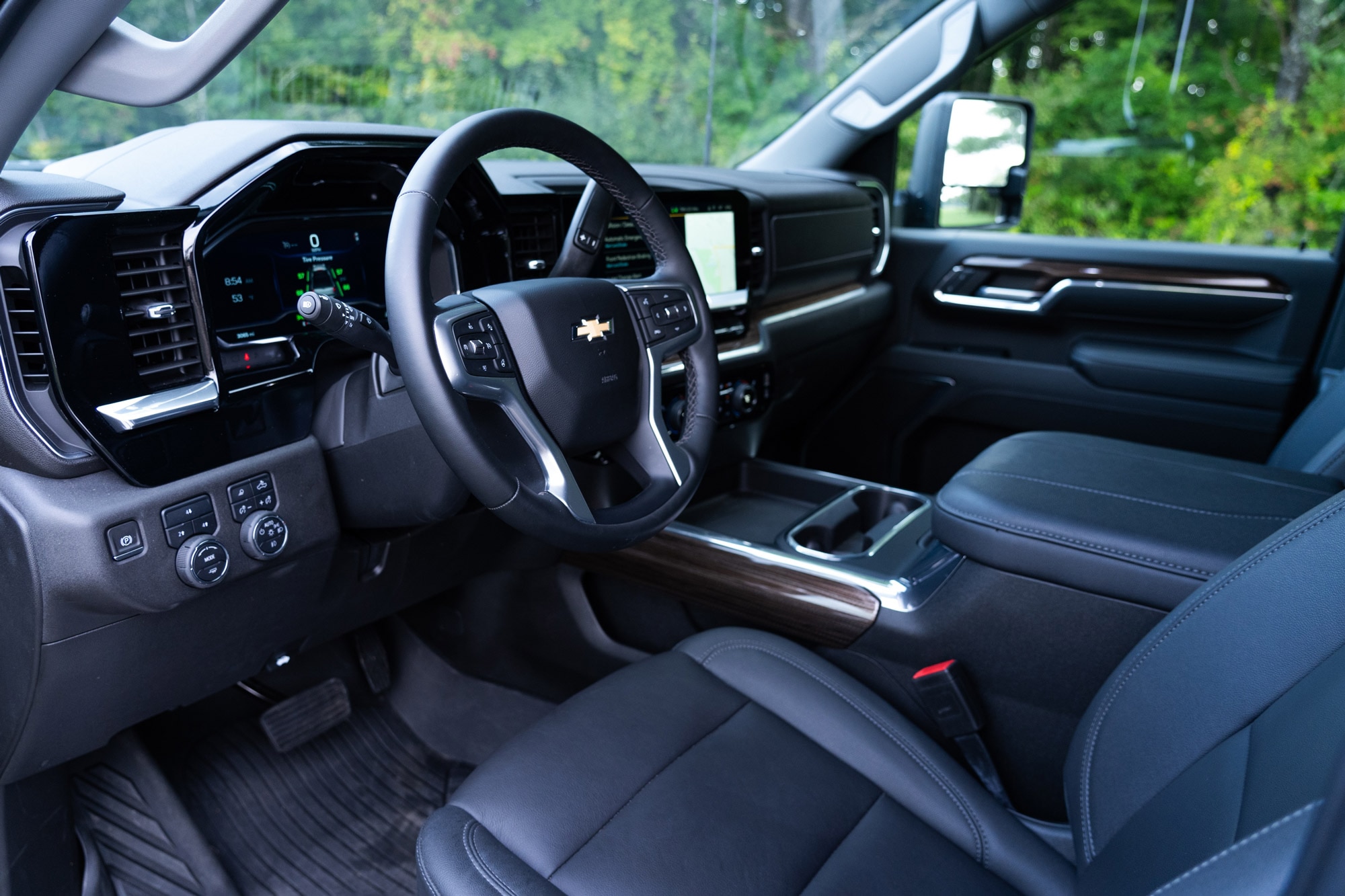 2024 Silverado 2500 HD steering wheel and driver's seat view.
