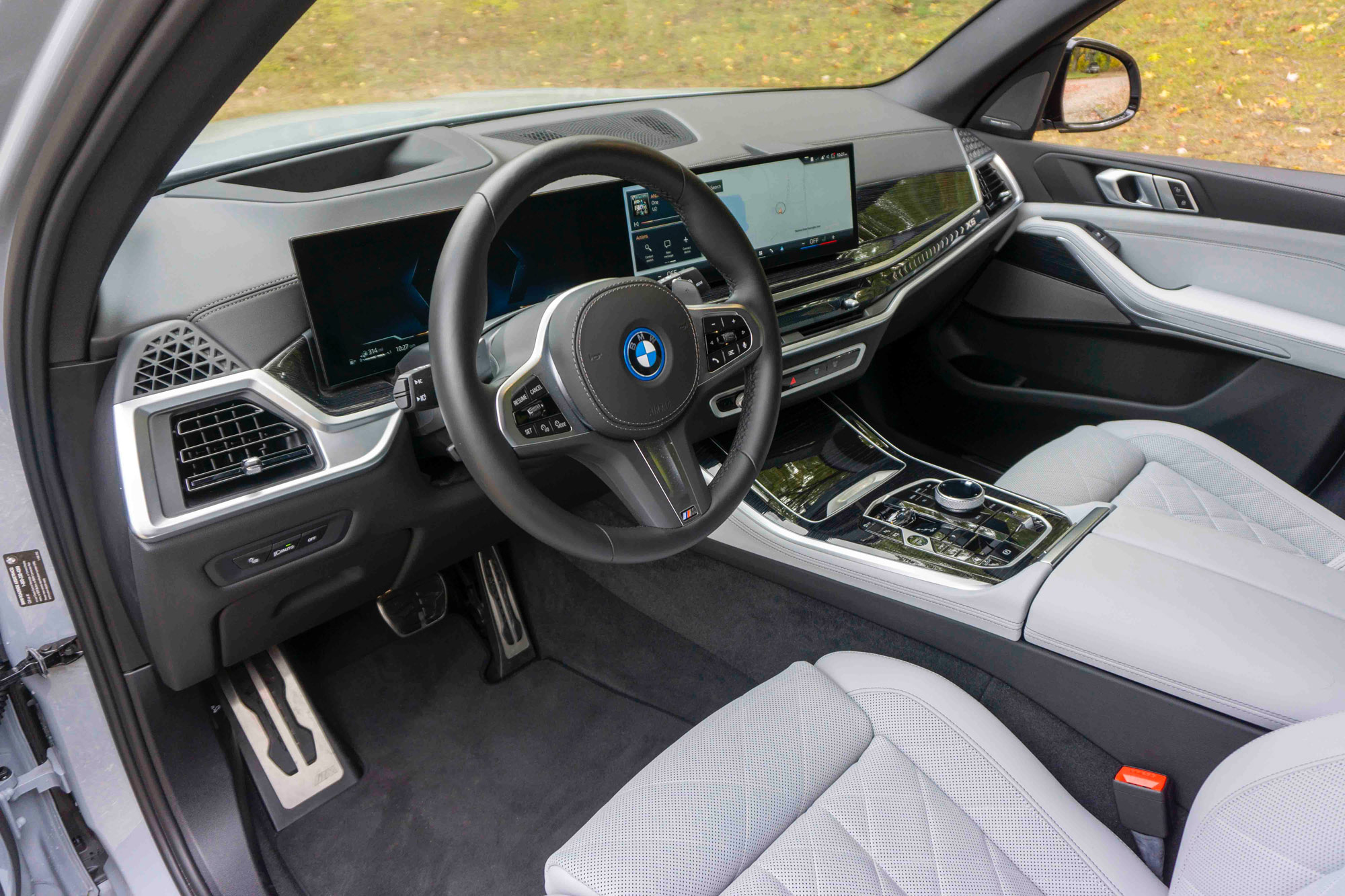 Grey 2024 BMW X5 xDrive50e interior and dashboard