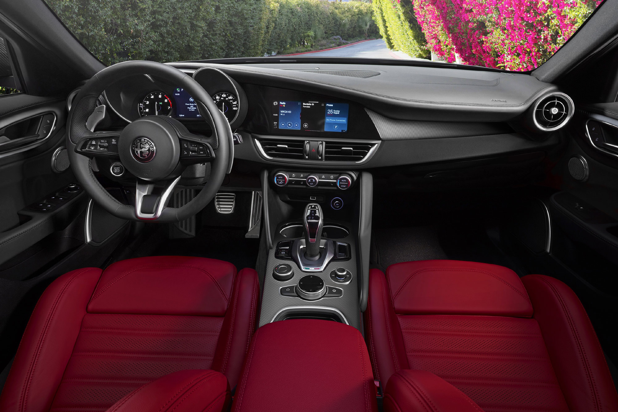 2023 Alfa Romeo Giulia interior dashboard and red seats