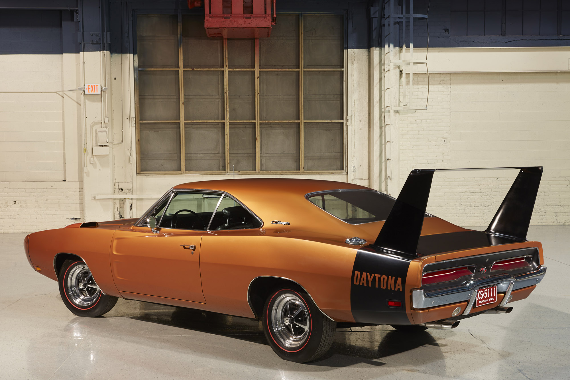 orange 1969 Dodge Daytona rear left quarter 