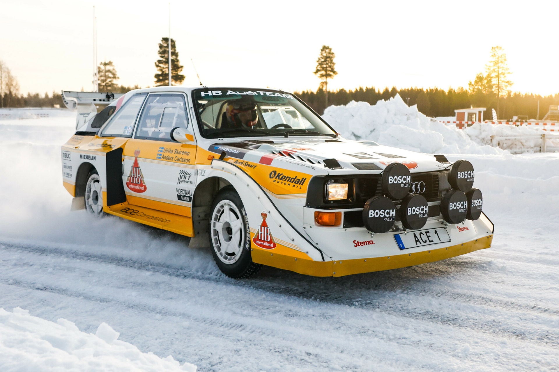 1985 Audi Sport Quattro S1 in race livery driving in the snow 