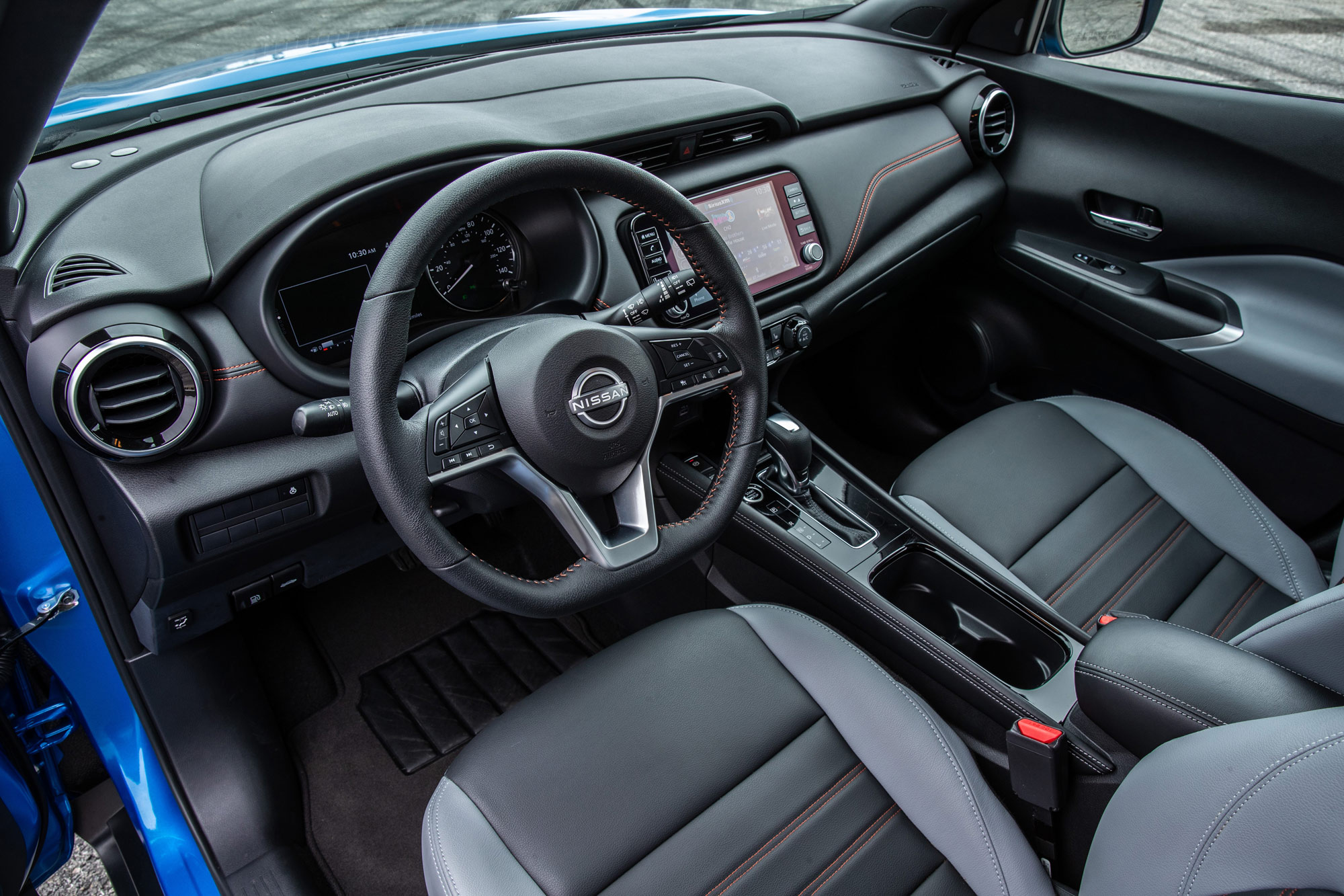 Steering wheel and dashboard in a 2024 Nissan Kicks