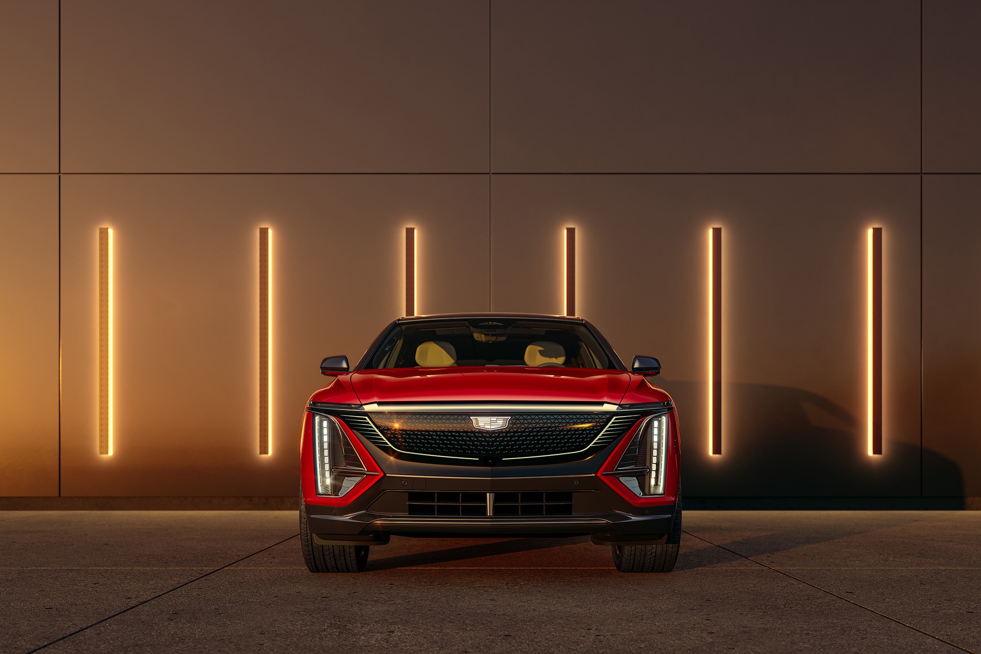  2024 Cadillac Lyriq in red, front view.