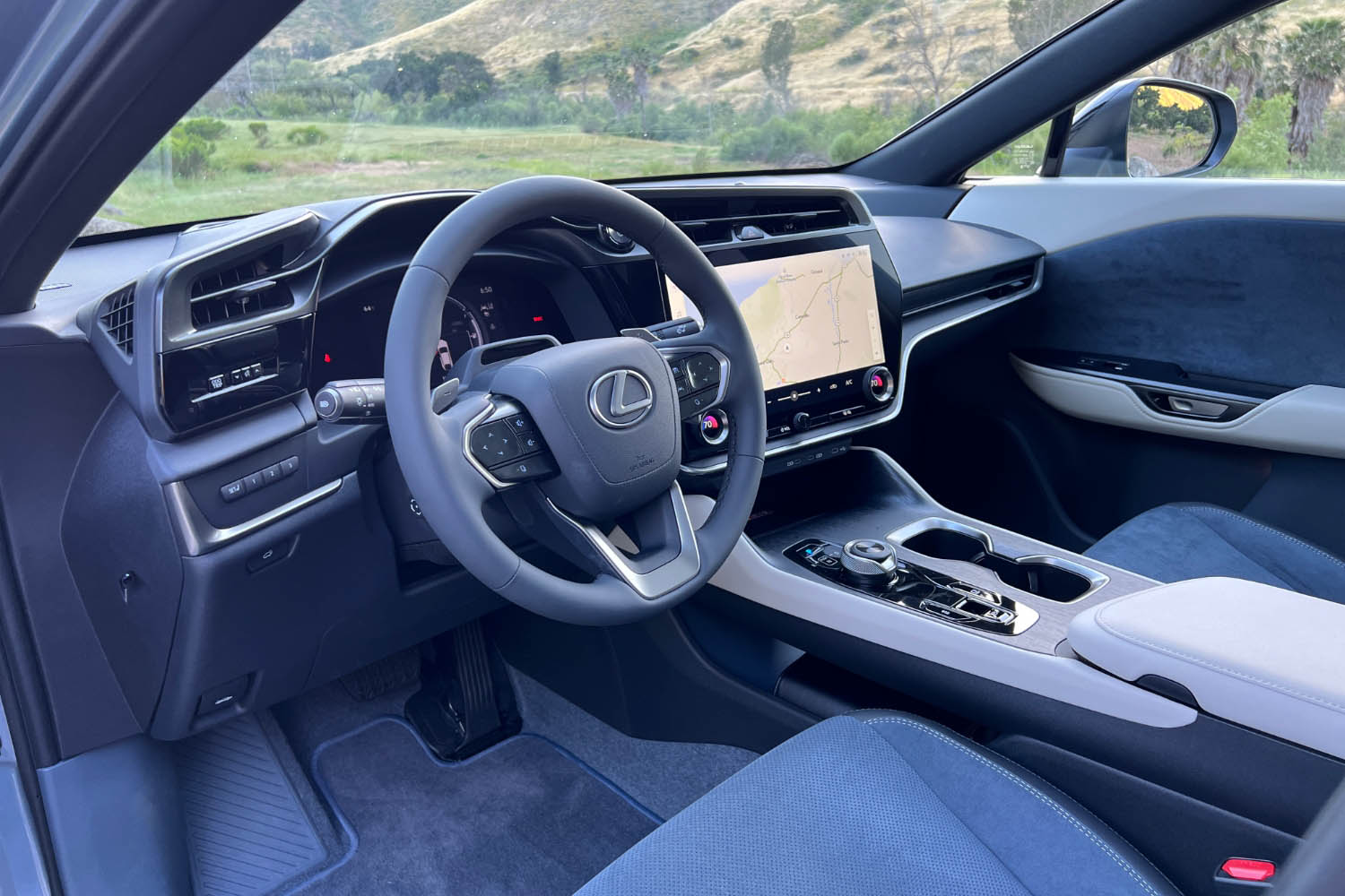 The front seats and dashboard of a 2023 Lexus RZ