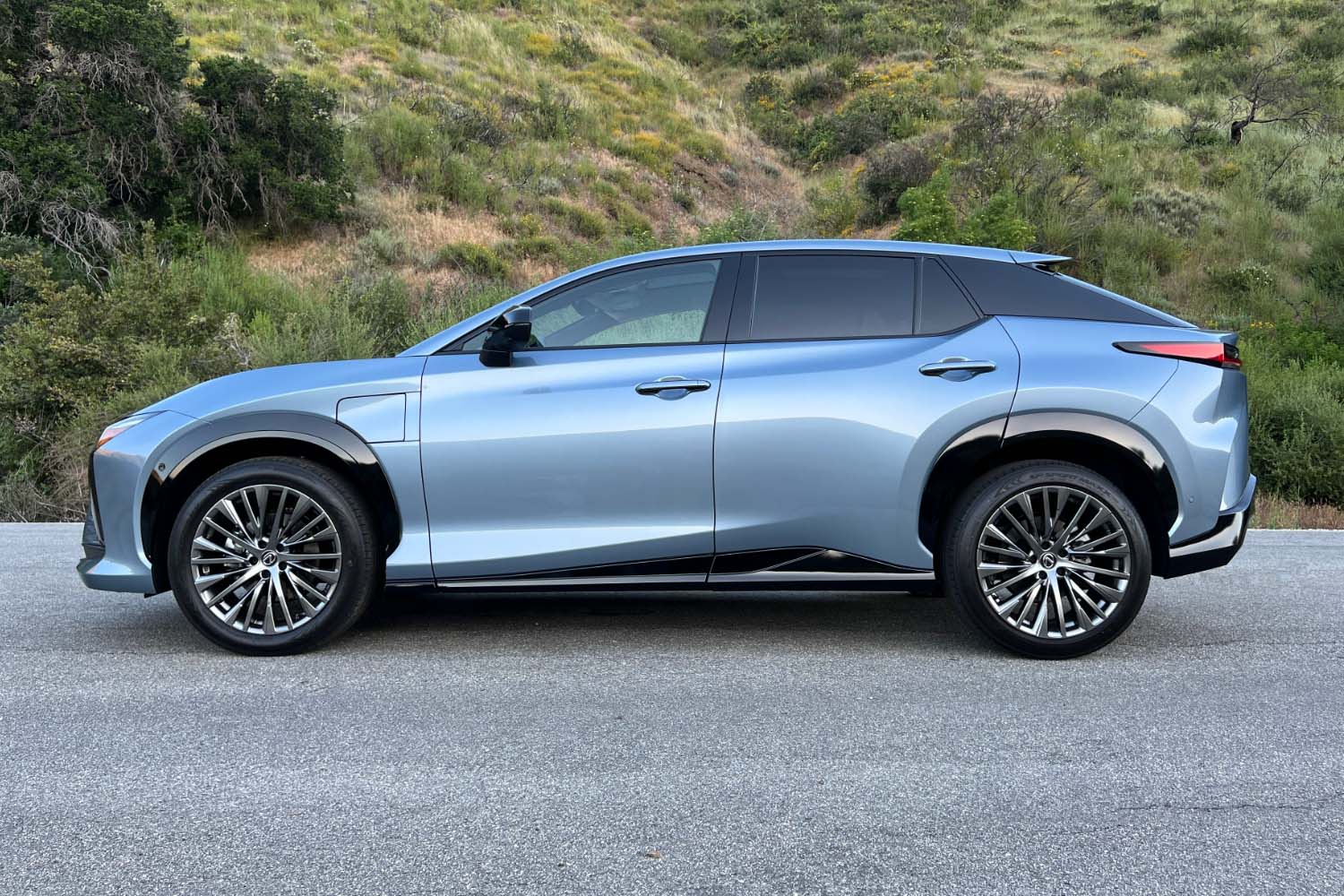 Side view of a blue 2023 Lexus RZ