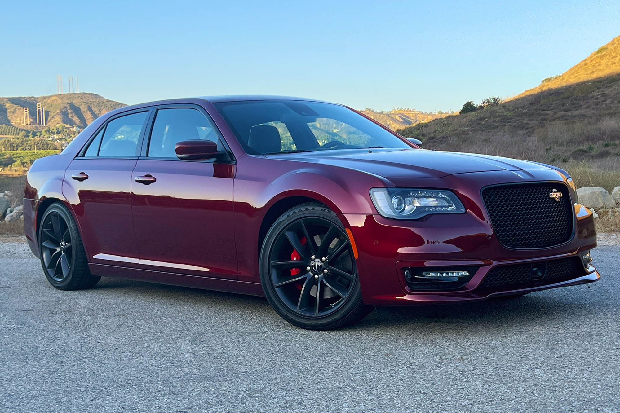 Right front quarter view of a red 2023 Chrysler 300