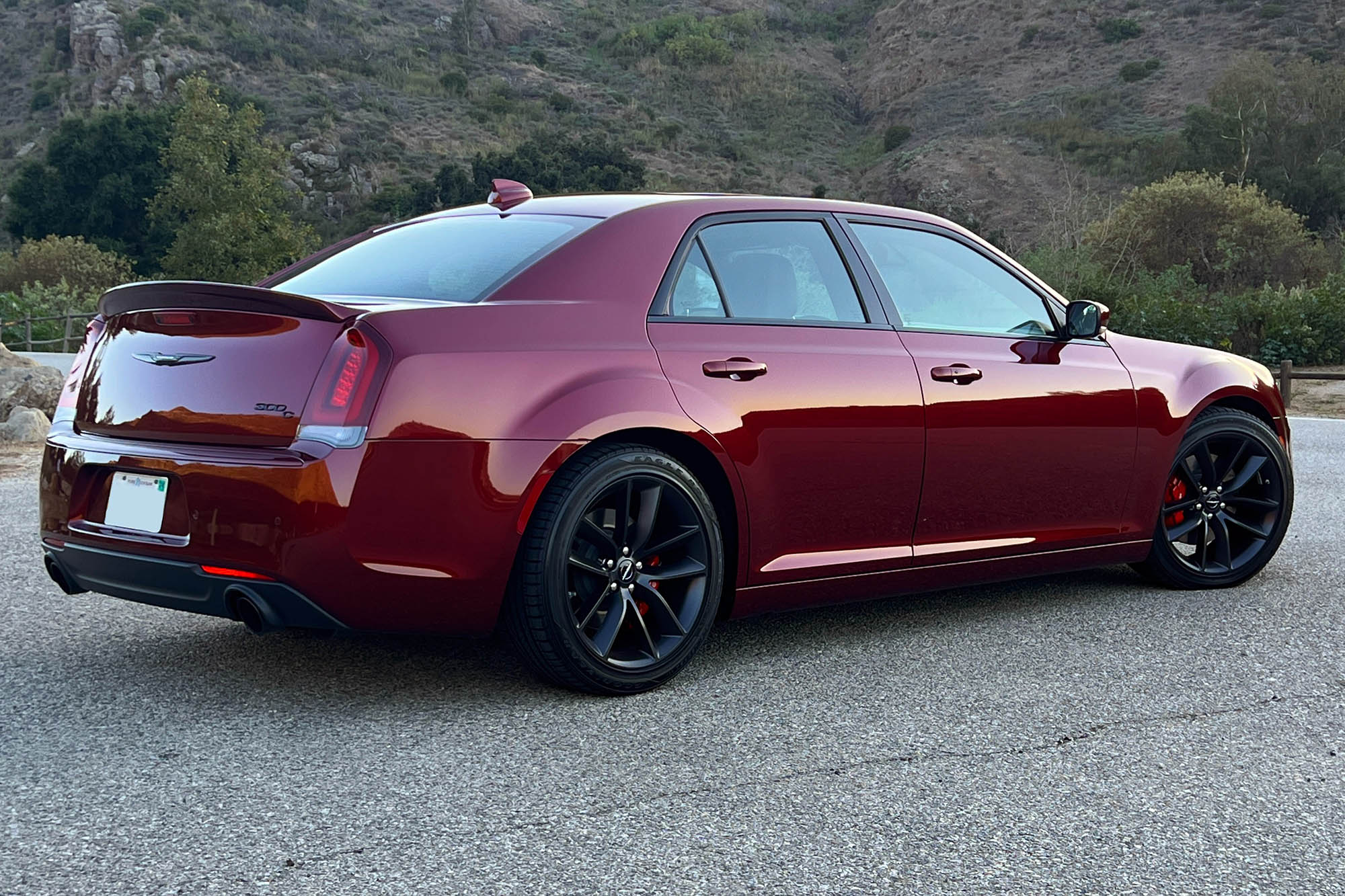 Right rear quarter view of a red 2023 Chrysler 300