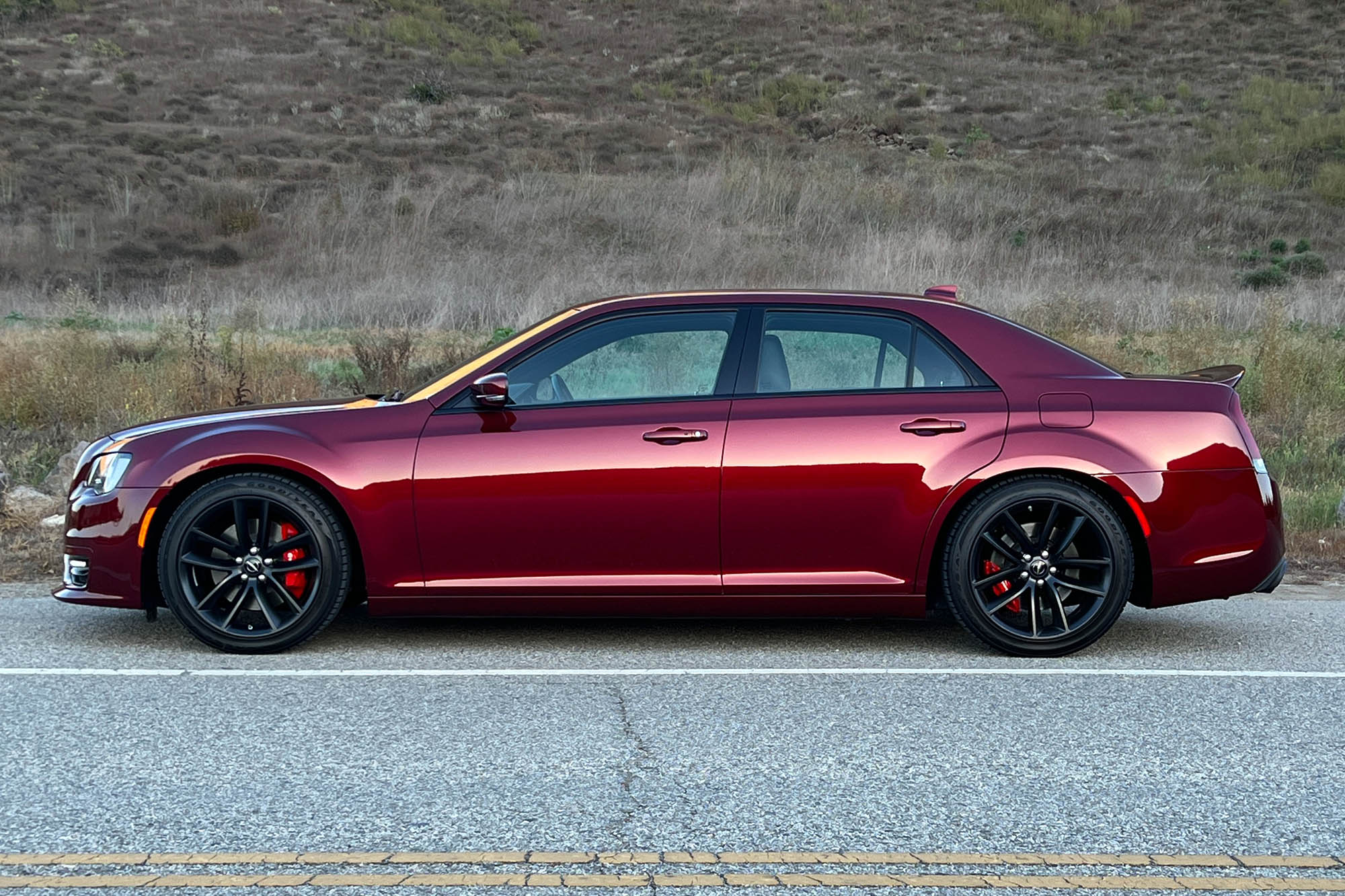 Side view of a red 2023 Chrysler 300