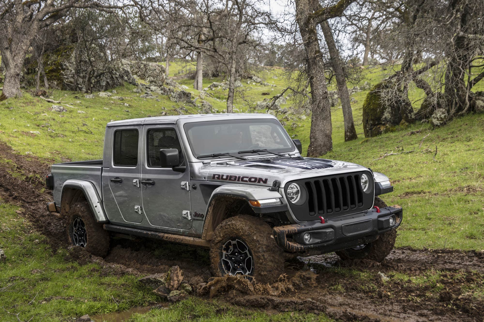2023 Jeep Gladiator FarOut edition with 3.0-liter EcoDiesel V-6 engine driving through mud