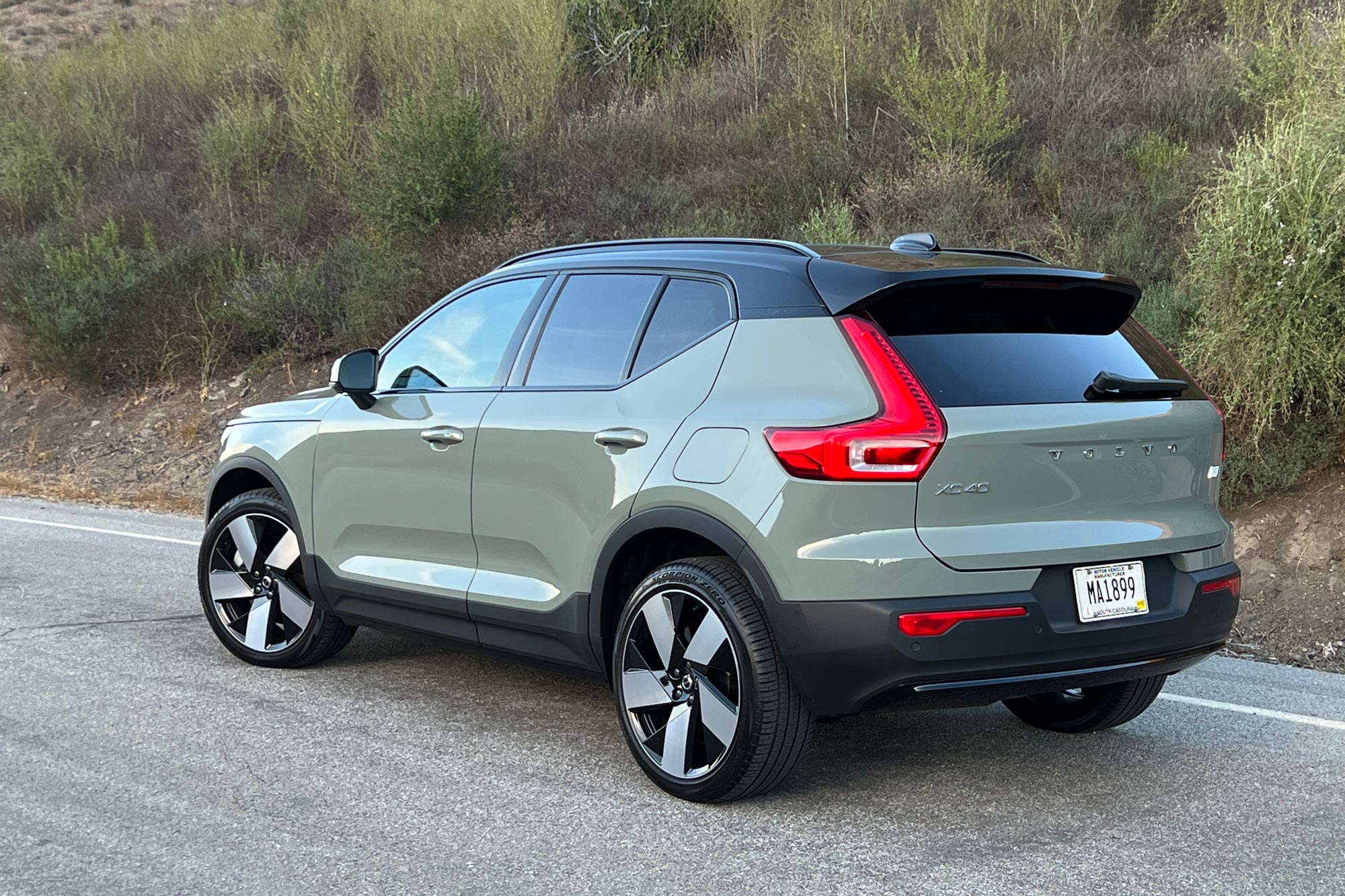 2023 Volvo XC40 Recharge parked on the side of a mountain road.